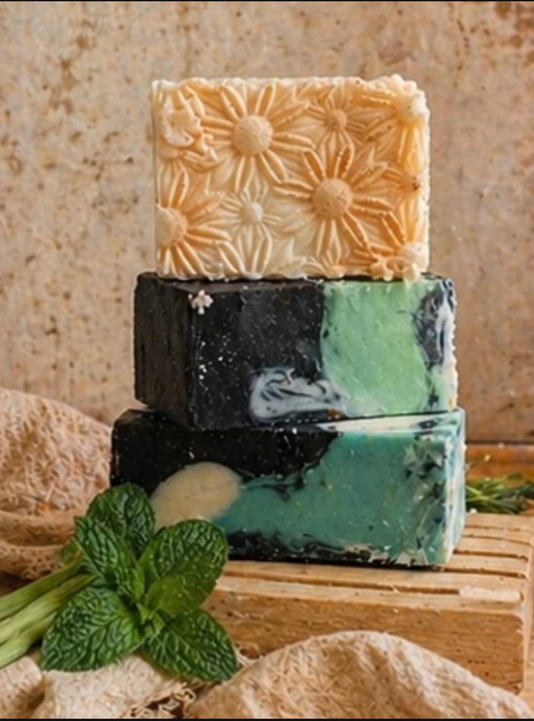 Handcrafted Wildgrain Co tallow soap bars with rosemary, lavender and honey